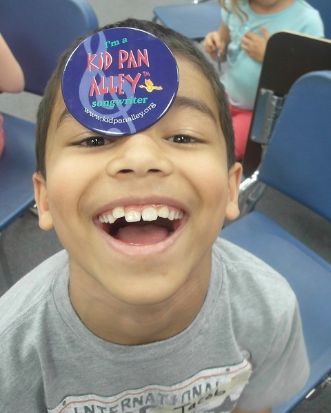 Kid Wearing KPA Button on his head